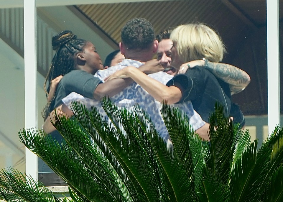 Some of the I'm A Celeb cast embrace as they meet for the first time