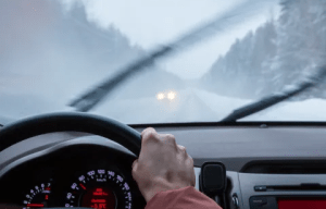 In winter, snow and ice is kept away, while in summer the windscreen cover protects the car interior from heat and dust (stock image)