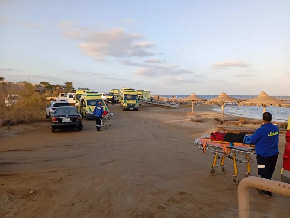 Medics waiting for possible survivors from the capsized yacht