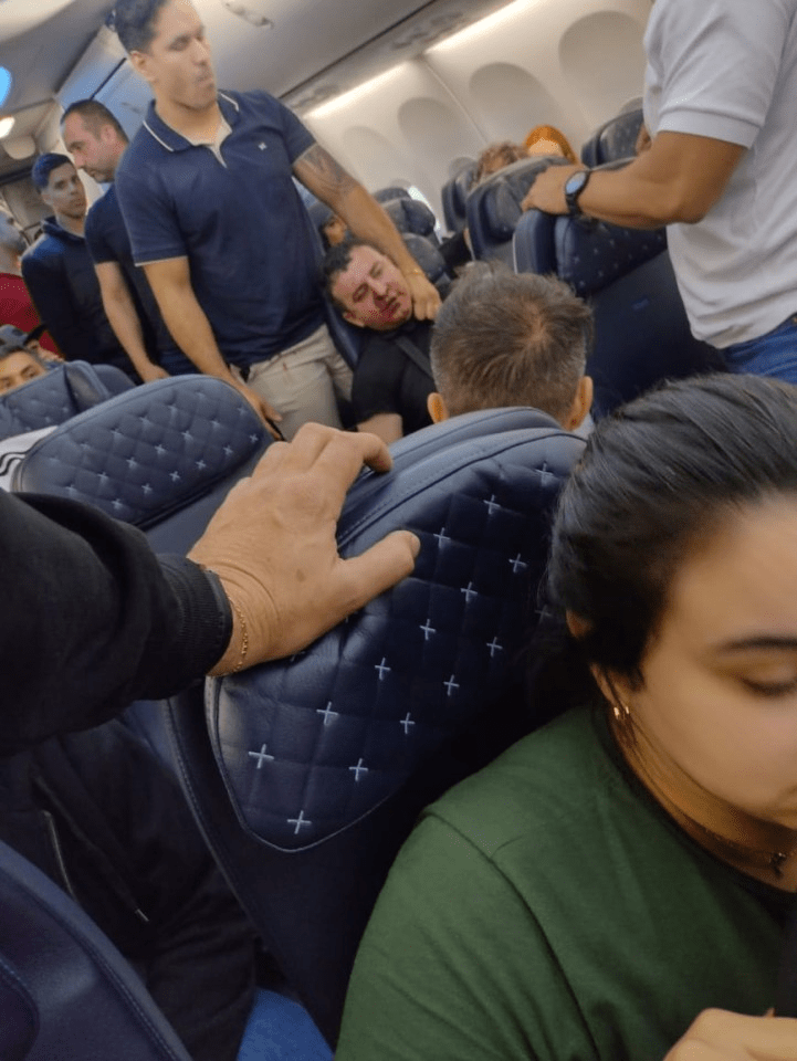 The man had to be held down by a passenger after he was caught