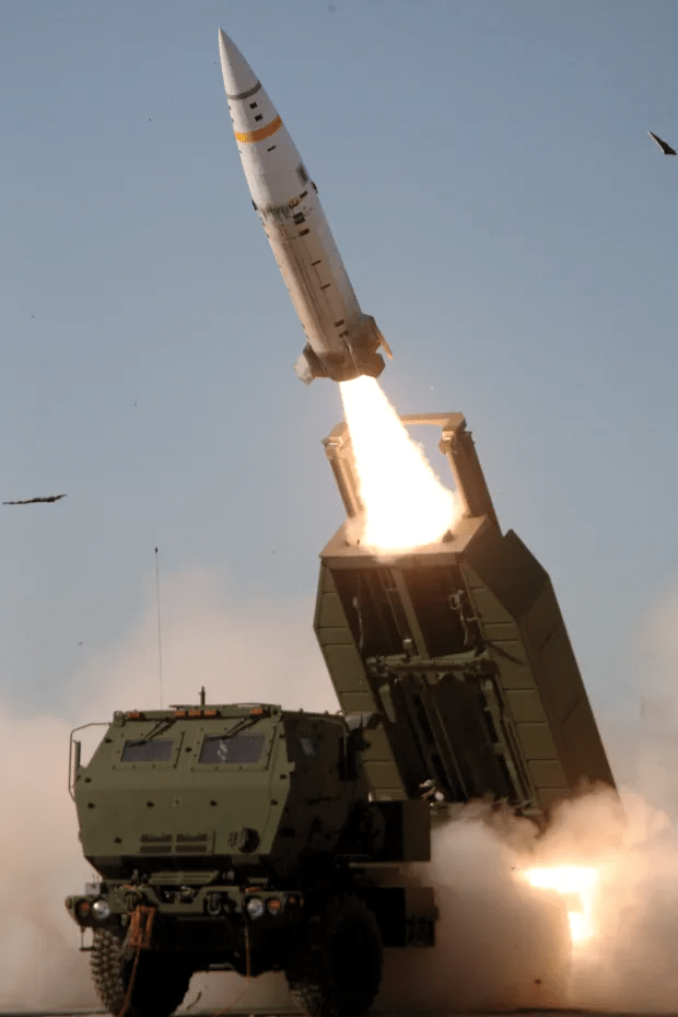 a rocket is being launched from a military vehicle