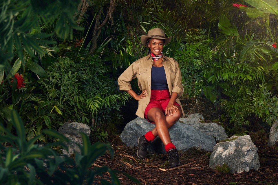 Pro dancer Oti Mabuse is showing off her toned legs in red shorts