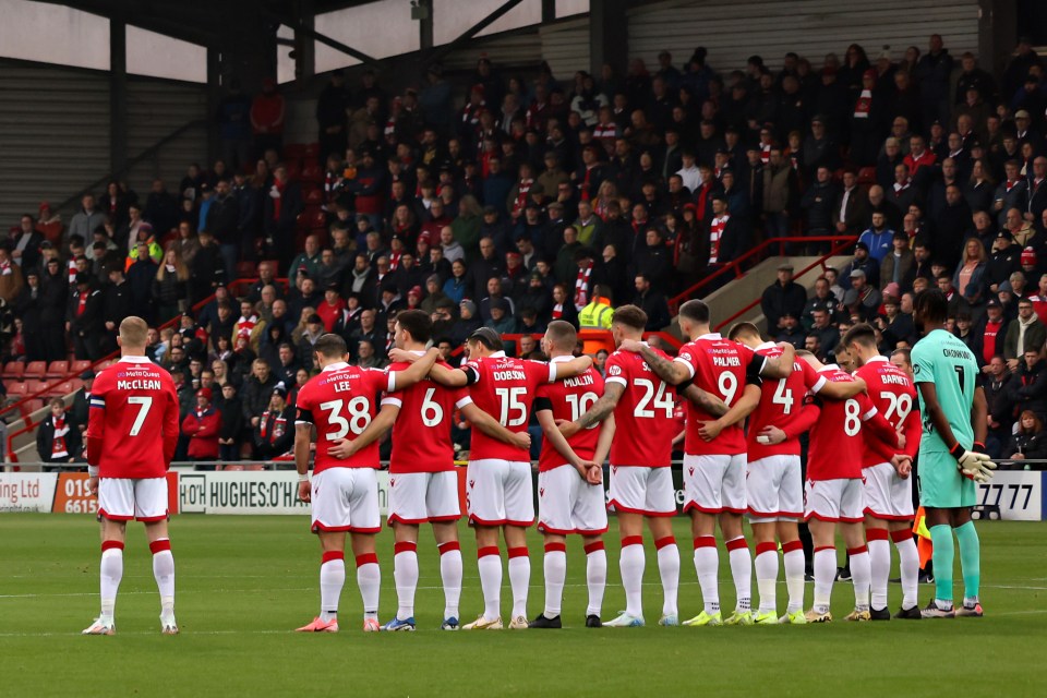 He stood apart from his team-mates during the minute of silence for Remembrance Day