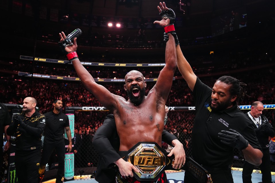 Jones celebrates retaining his heavyweight title