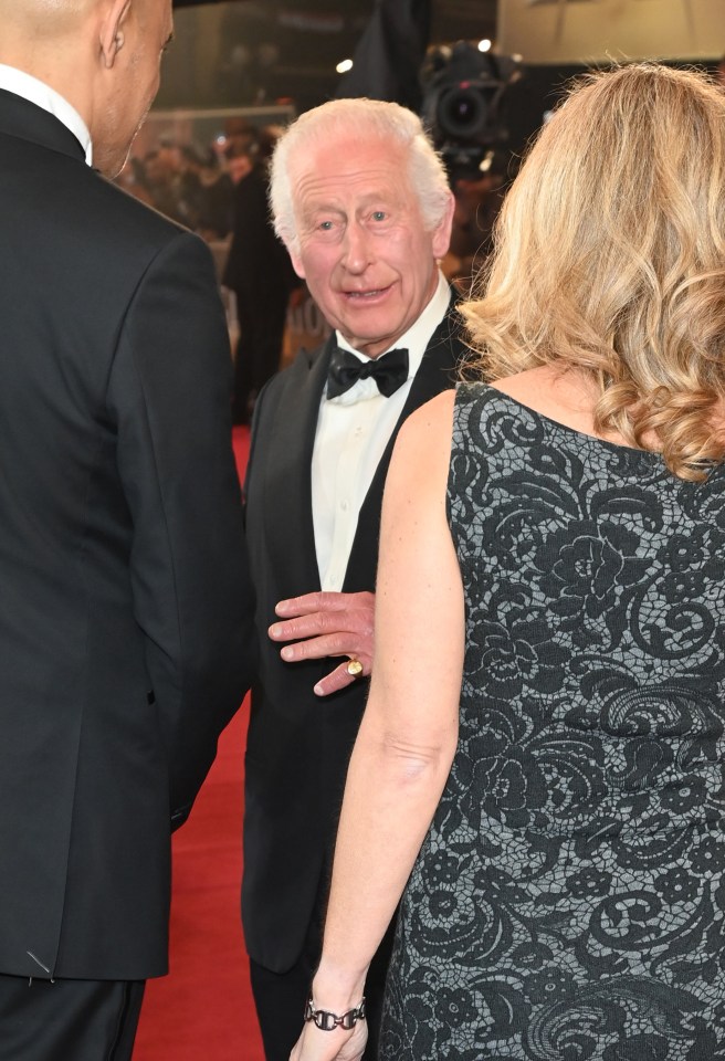 King Charles appeared in high spirits on the red carpet on Wednesday