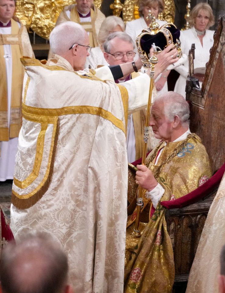 Welby carefully lowered the 22-carat gold crown on to Charles’ head at the coronation