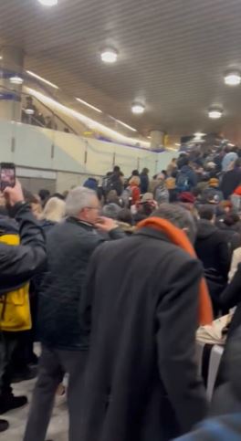 Photos posted on social media show crowds of commuters gathered next to the barriers