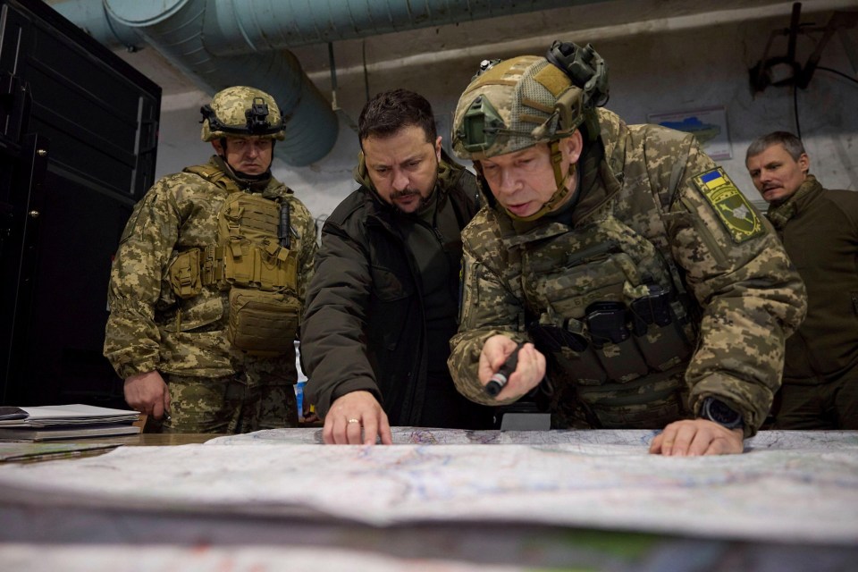 a soldier with a patch that says ukraine on it