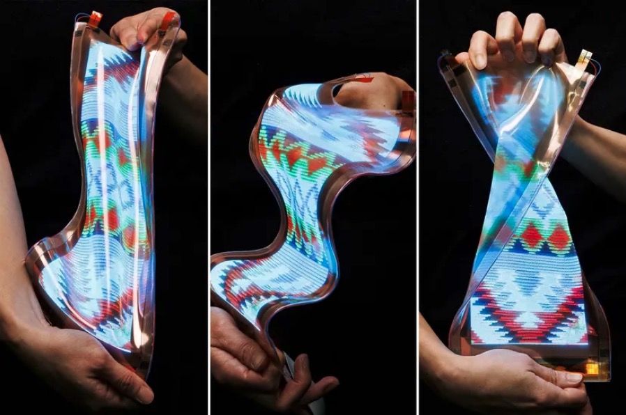 a person is holding a clear object with a pattern on it