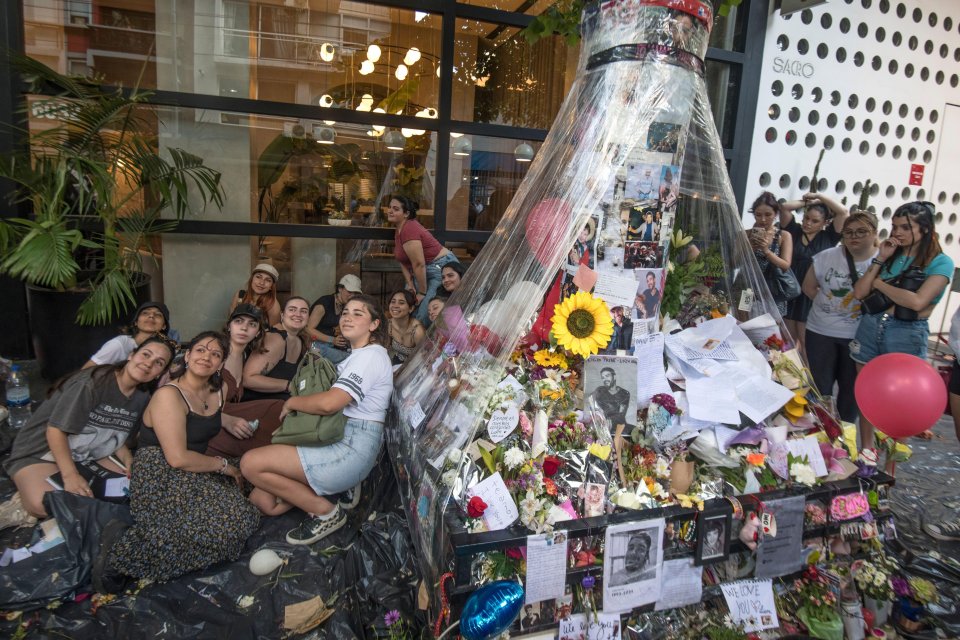 A memorial set up by fans outside CasaSur Hotel in Buenos Aires