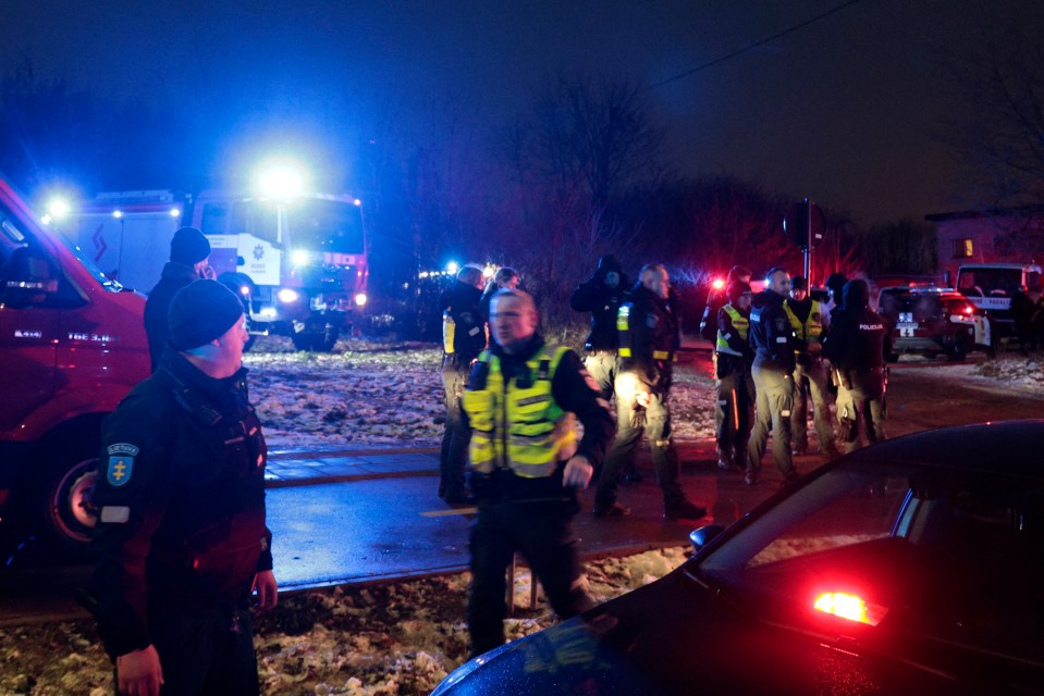 Police at the scene of the crash near Vilnius Airport