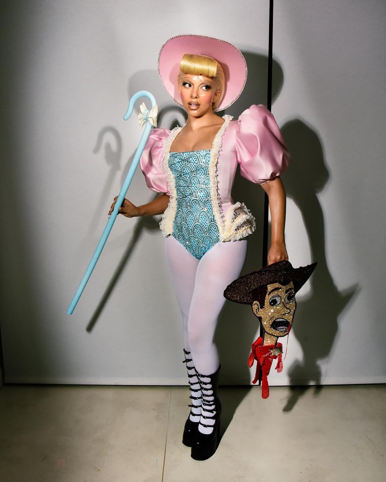 a woman dressed as bo peep from toy story