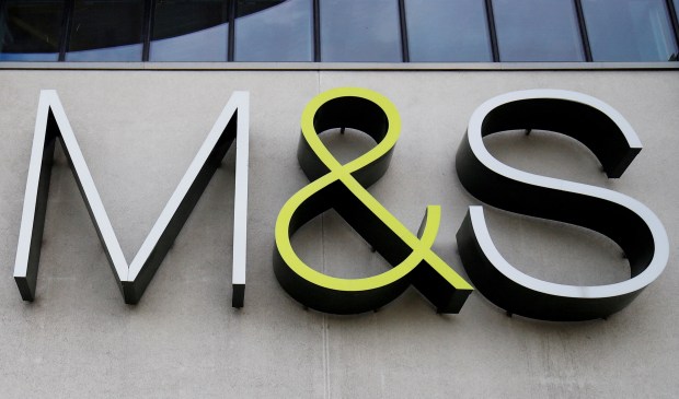 a large m &amp; s sign on the side of a building