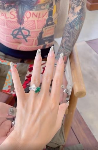 Machine Gun Kelly later said that the ring was designed to hurt if she took it off