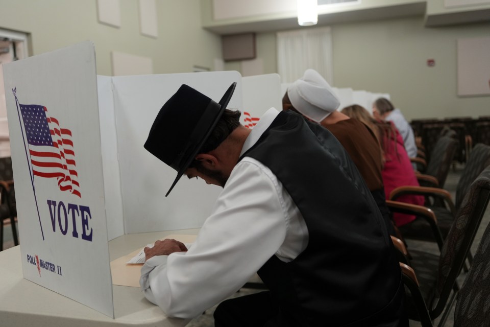 Members of the Amish community voted at a polling centre in New Holland, Pennsylvania