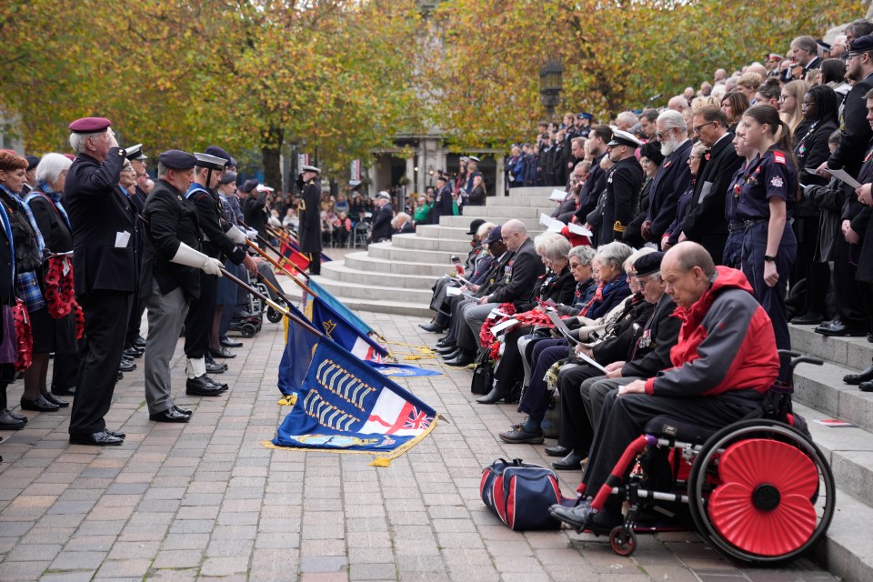 Military veterans during a minute of silence during a Remembrance Sunday service in Guildhall Square, Portsmouth