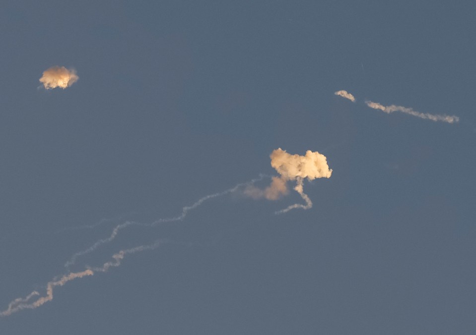 Missile traces can be seen over Kyiv after several missile explosions