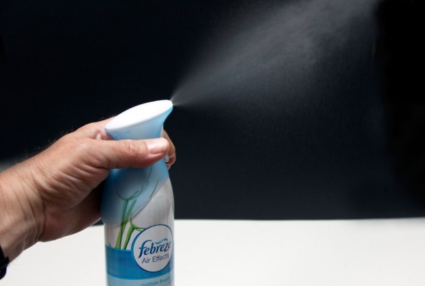 DAMBJE Using air freshener spray in the home, London