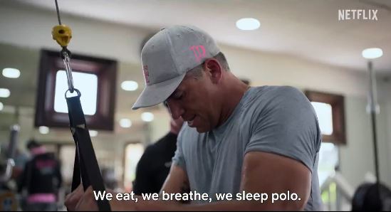 a man is using a machine in a gym and saying `` we eat , we breathe , we sleep polo . ''