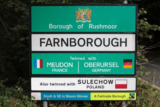 a sign that says borough of rushmoor and farnborough