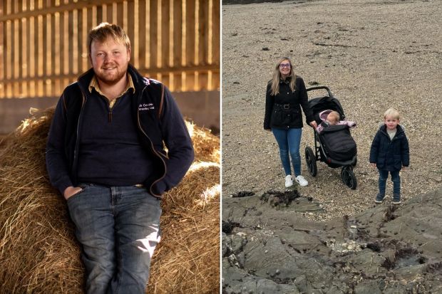 a man sitting on a bale of hay next to a woman pushing a baby in a stroller