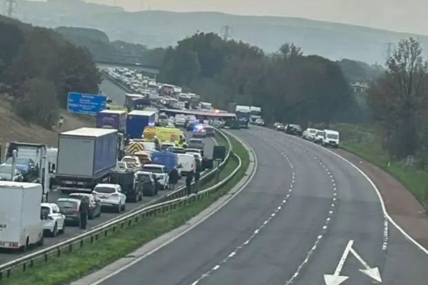 a busy highway with an arrow pointing to the right