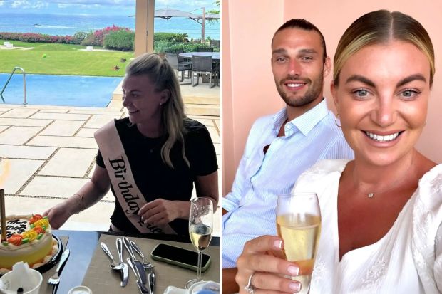 a woman wearing a birthday sash sits at a table next to a man holding a glass of champagne