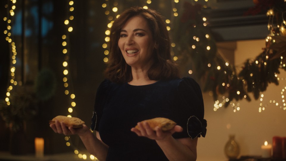 Nigella tucks into a festive bake during the advert