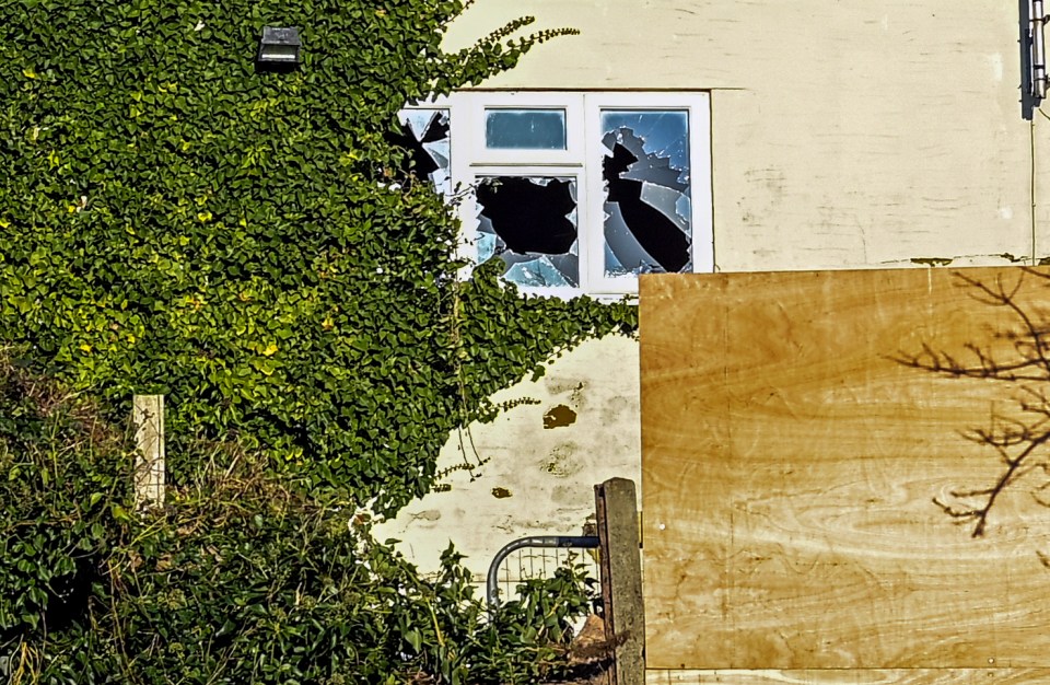 An abandoned care home with smashed windows