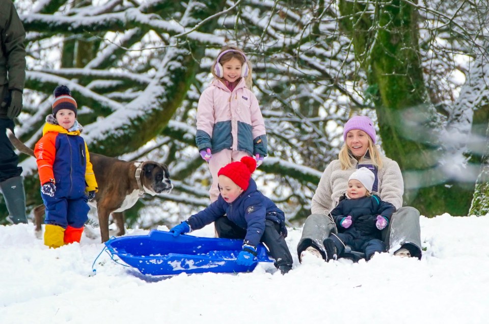 Children enjoyed the snow on sleds in Buxton, Derbyshire