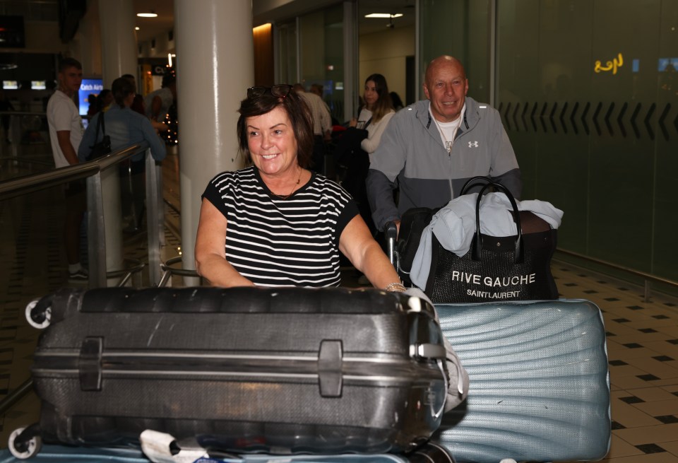 Tony and Colette McLoughlin touched down at Brisbane Airport at 10.40pm local time