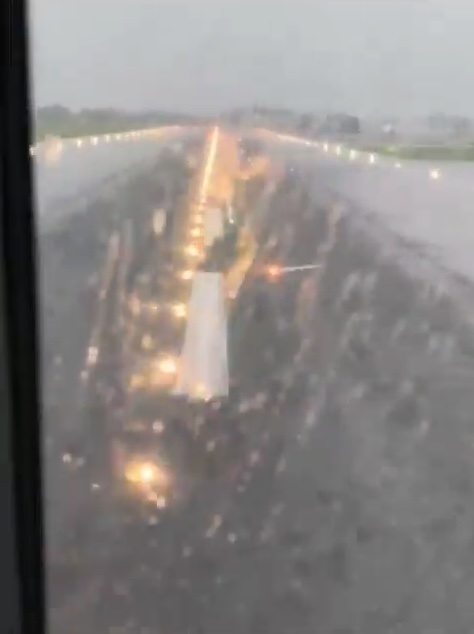 Footage shows the moment a pilot tries to land at Malaga Airport during heavy rain