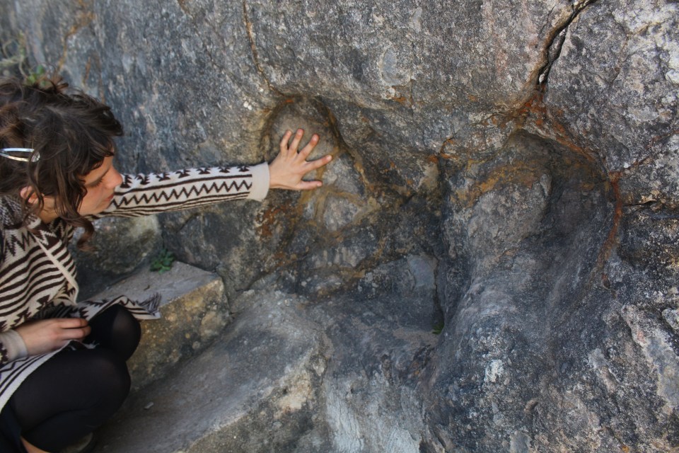 The cliffs of Praia Grande do Rodízio have dinosaur footprints so large it takes a moment for visitors to realise what they're seeing