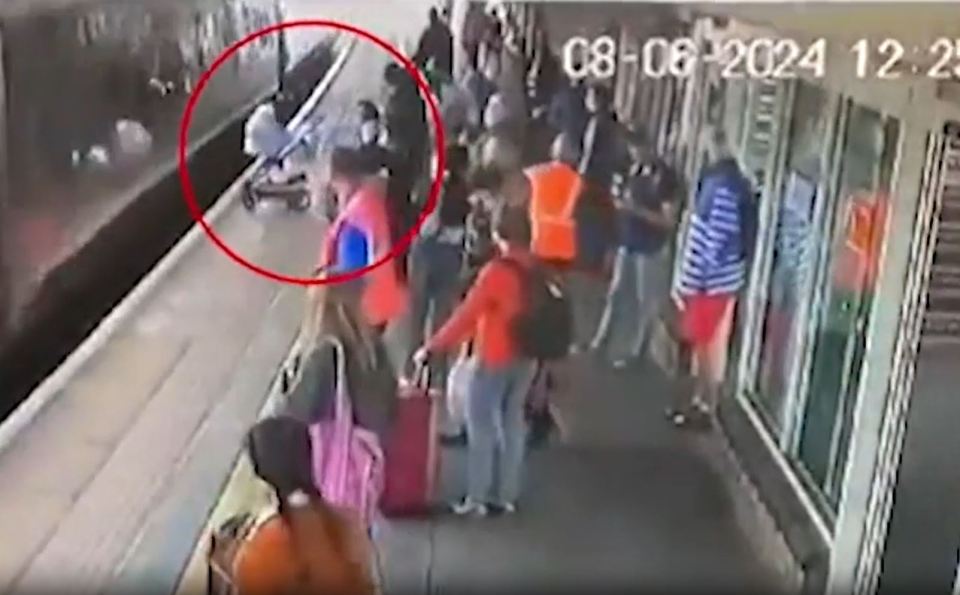 The pram slowly rolled towards the tracks in horrifying footage