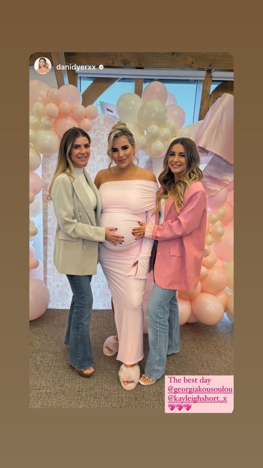 Love Island winner Dani Dyer, right, placed a tender hand on Georgia's bump