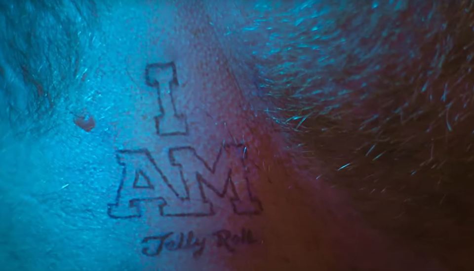 a close up of a tattoo that says i am jelly roll