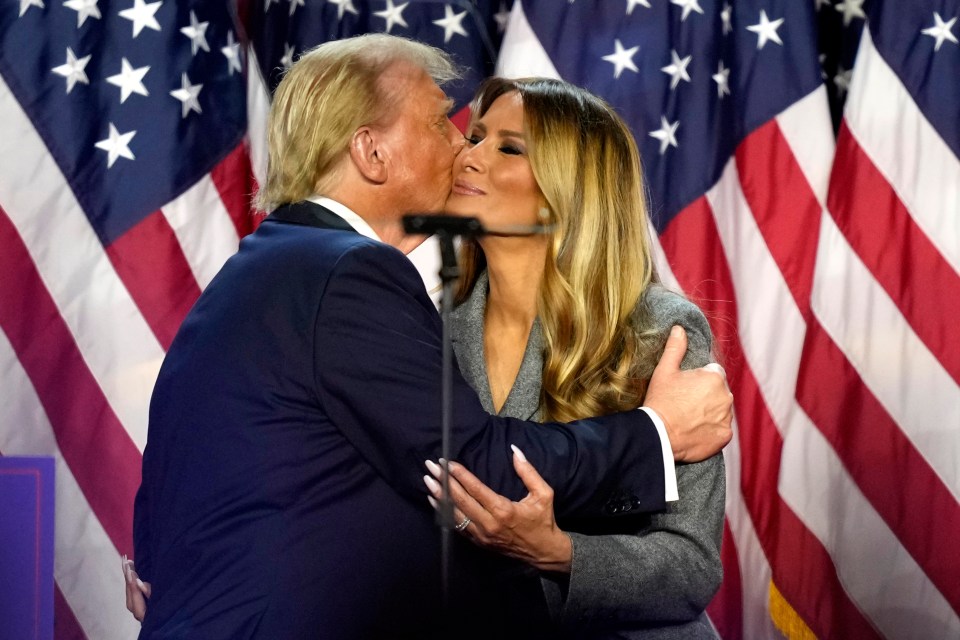 Trump kissed his wife Melania as he took to the stage at an election night watch party