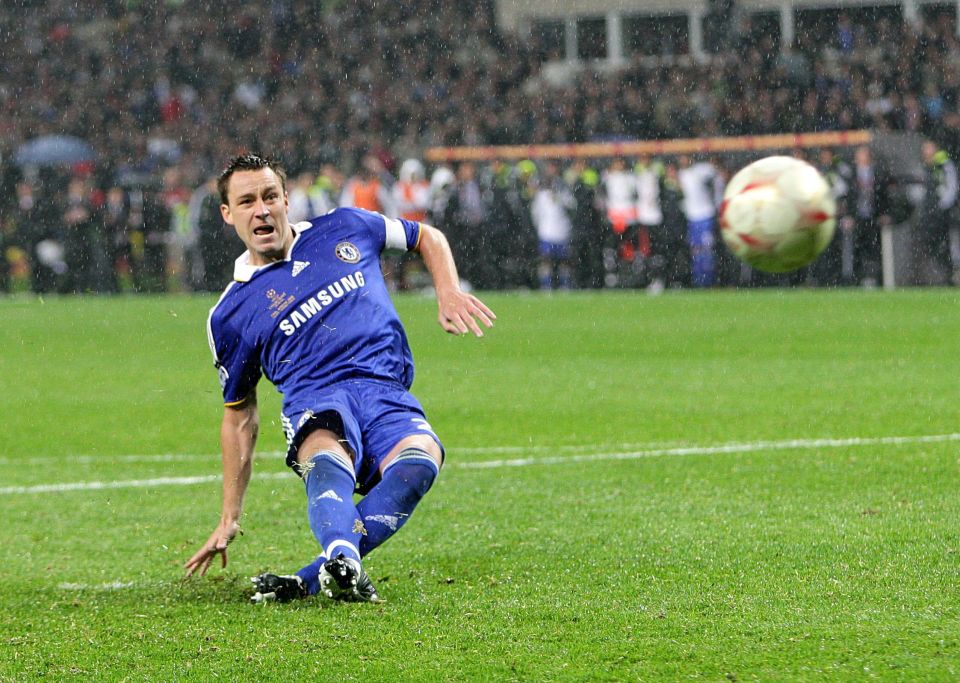 a soccer player wearing a samsung jersey kicks the ball