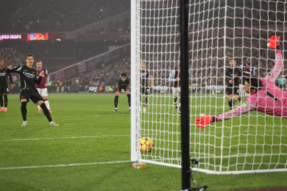 Martin Odegaard slots home a penalty to extend Arsenal's lead.