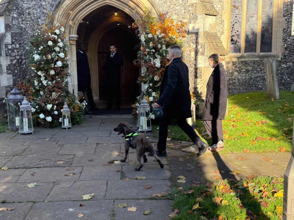 Security and sniffer dogs seen outside the church