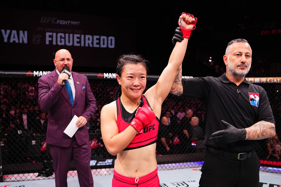 Shi Ming celebrates winning the 'Road to UFC' strawweight tournament