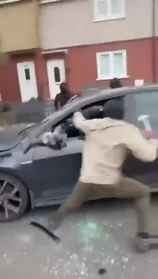 They run up to the victim's car and smash the windows