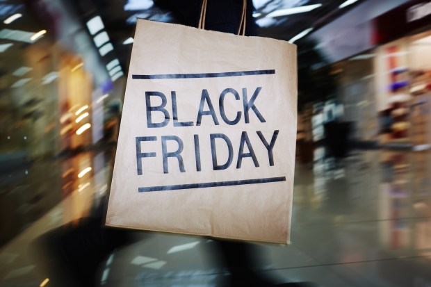 a brown paper bag that says black friday on it