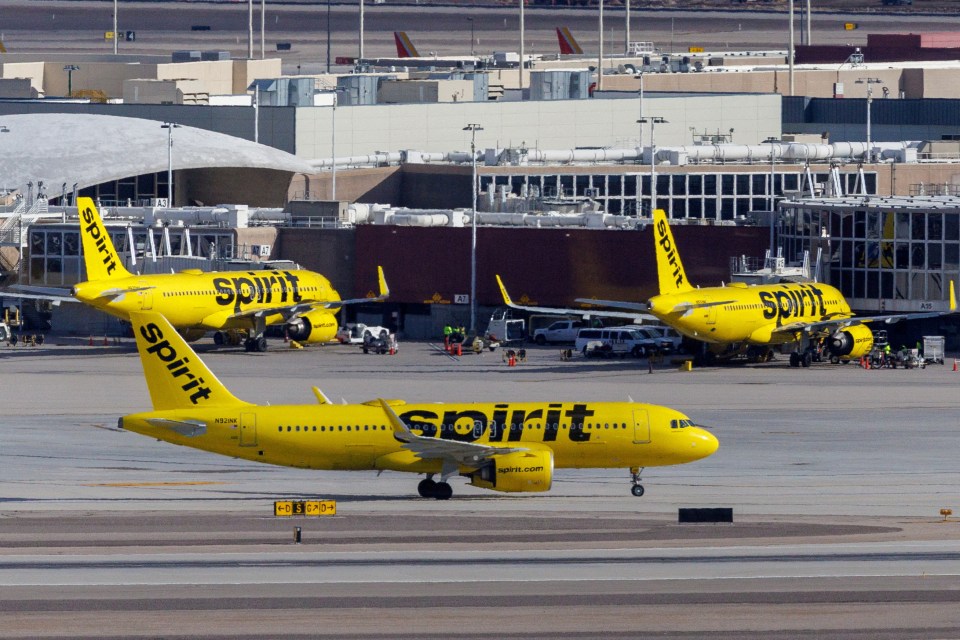 three spirit planes are parked on the tarmac at an airport