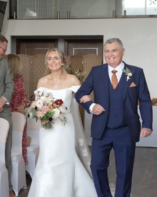 Neil proudly walks his daughter down the aisle - but did you spot the mistake he made beforehand?