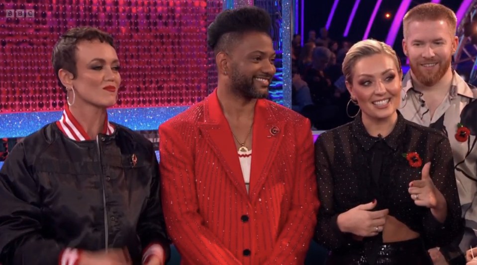 Amy put on a 'brave' face as she supported the pair from the studio