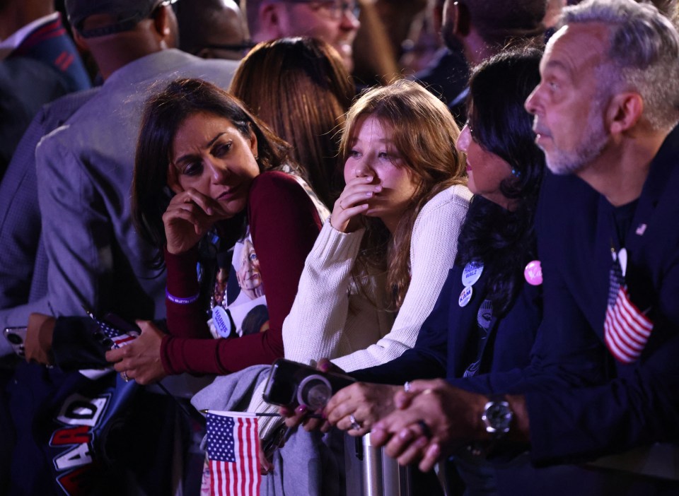 Harris voters look downcast outside her camp in Washington DC