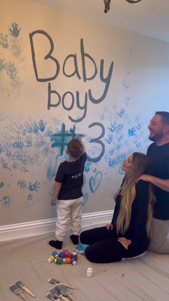 The words "Baby boy #3" had been painted on a wall inside their house