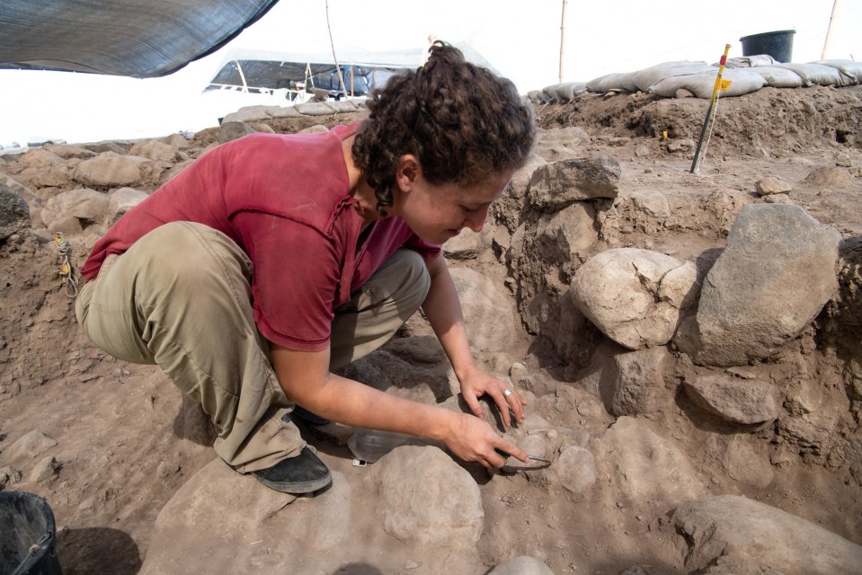 Talia Yashuv at the Nahal Ein Gev II excavation site where the stones where discovered