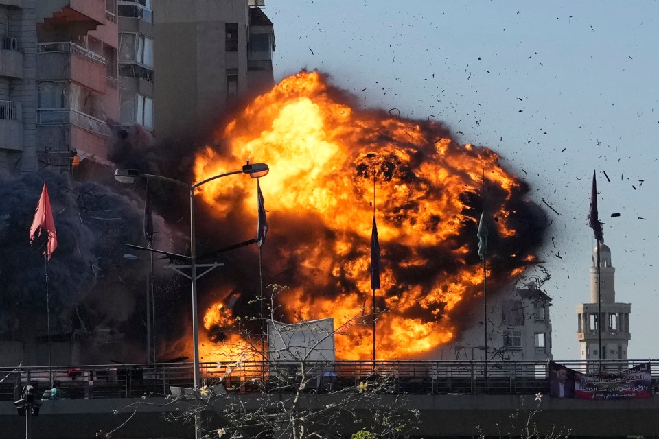 Thick smoke and flames erupt from an Israeli airstrike on Tayouneh, Beirut